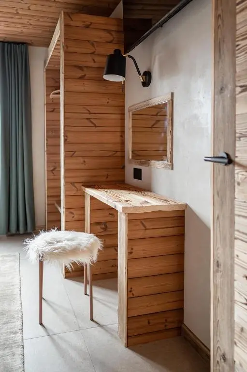 a home office with a desk and a chair at Osprey Lodge in Aviemore