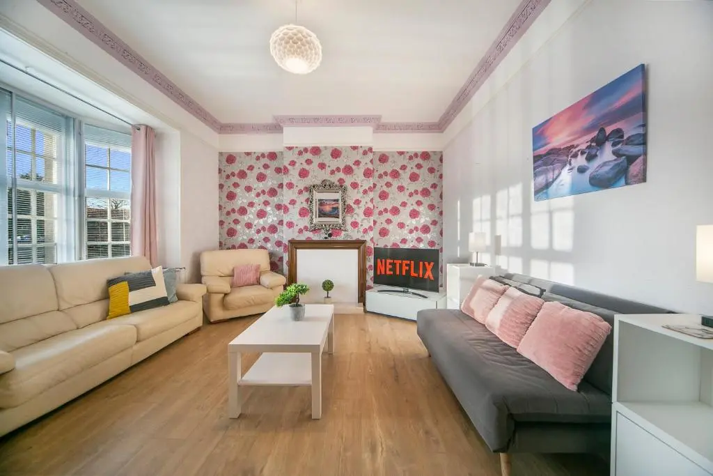 a living room with a couch and a table at Constancevilla B7 - Grampian Lettings Ltd in Aberdeen