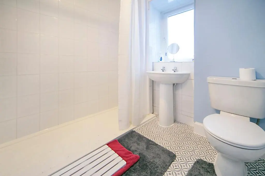 a bathroom with a toilet and a sink at Constancevilla B7 - Grampian Lettings Ltd in Aberdeen