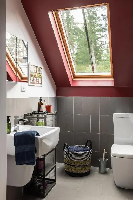 a bathroom with a sink and a window at Number 5 Steading Cottage in Banchory