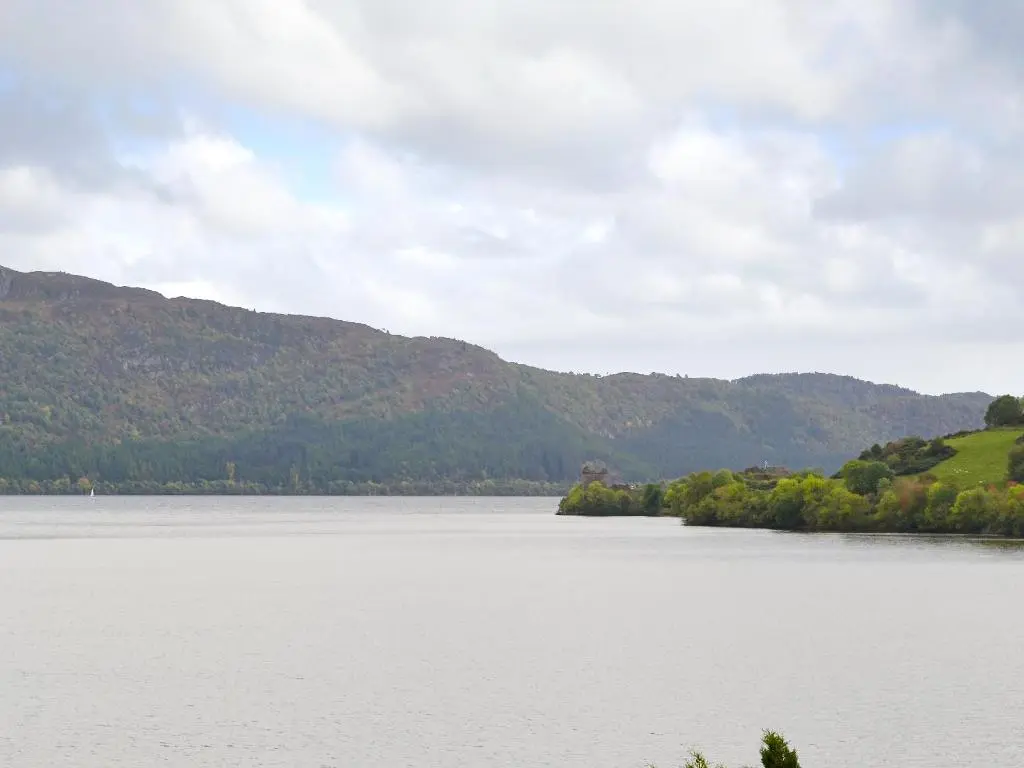 a large body of water with mountains in the background at Temple House West in Drumnadrochit