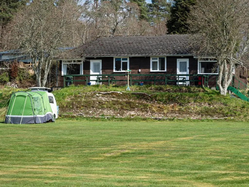 a house with a tent in front of a yard at Holiday Home Isle of Skye by Interhome in Contin