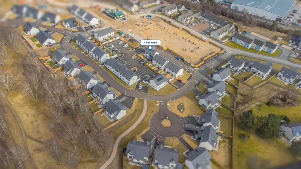 a model of a suburb with a road and houses at 4 Ben Avon in Aviemore