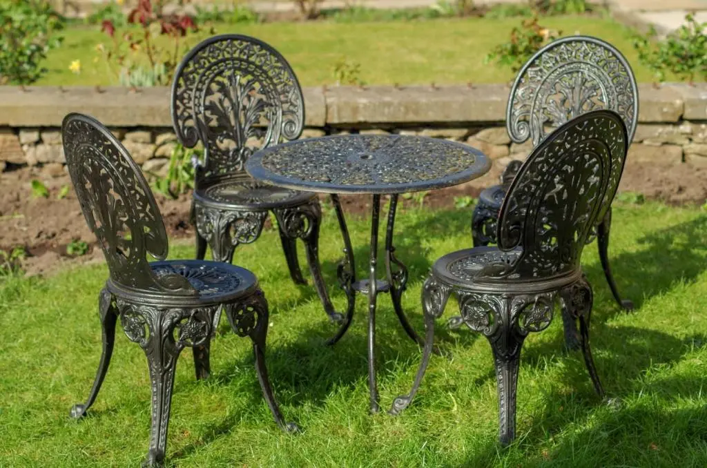 three chairs and a table and a table and chairs at Room Only Corbies Rest in Inverness