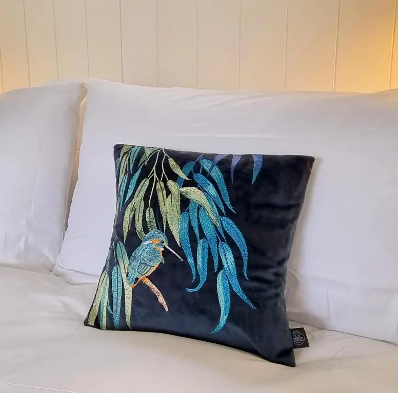 a pillow sitting on top of a bed at Bombie Glamping Pod in Grantown on Spey