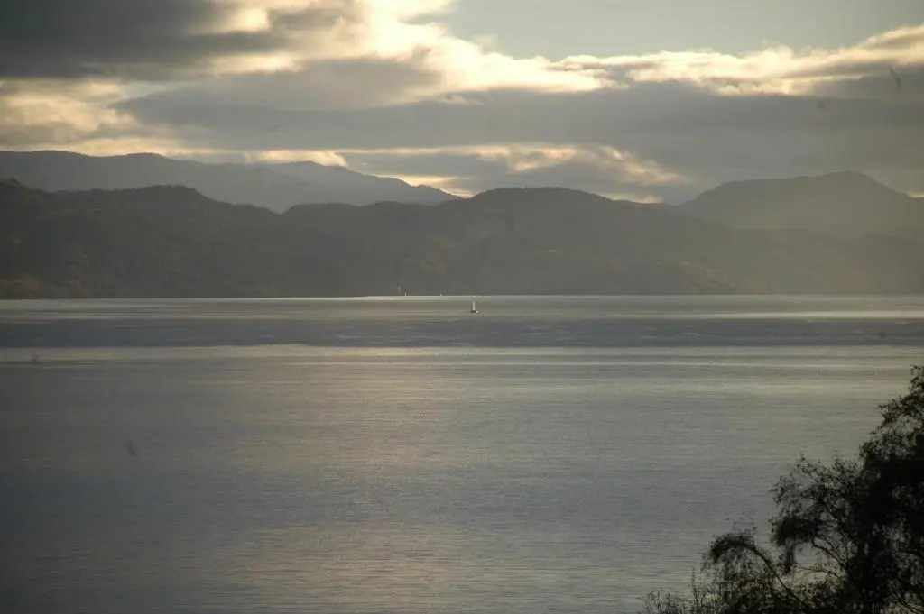 a view of a large body of water with mountains at Camping Pod Heaven in Brackla