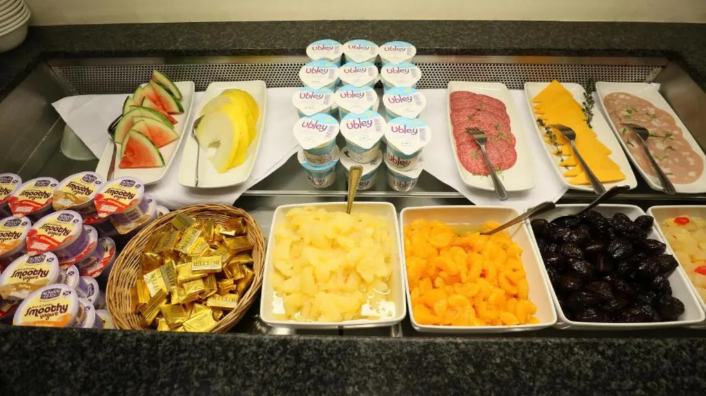 a buffet with different types of food and drinks at Columba Hotel Inverness by Compass Hospitality in Inverness