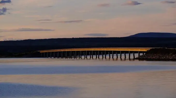 a bridge over a large body of water at Binka - Luxury 40 x 14ft Lodge in Tain