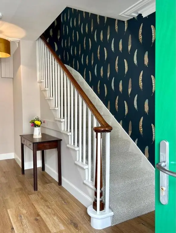 a stairwell with a stair case with a stair tread at The Fiddich Luxury Home in Craigellachie in Craigellachie