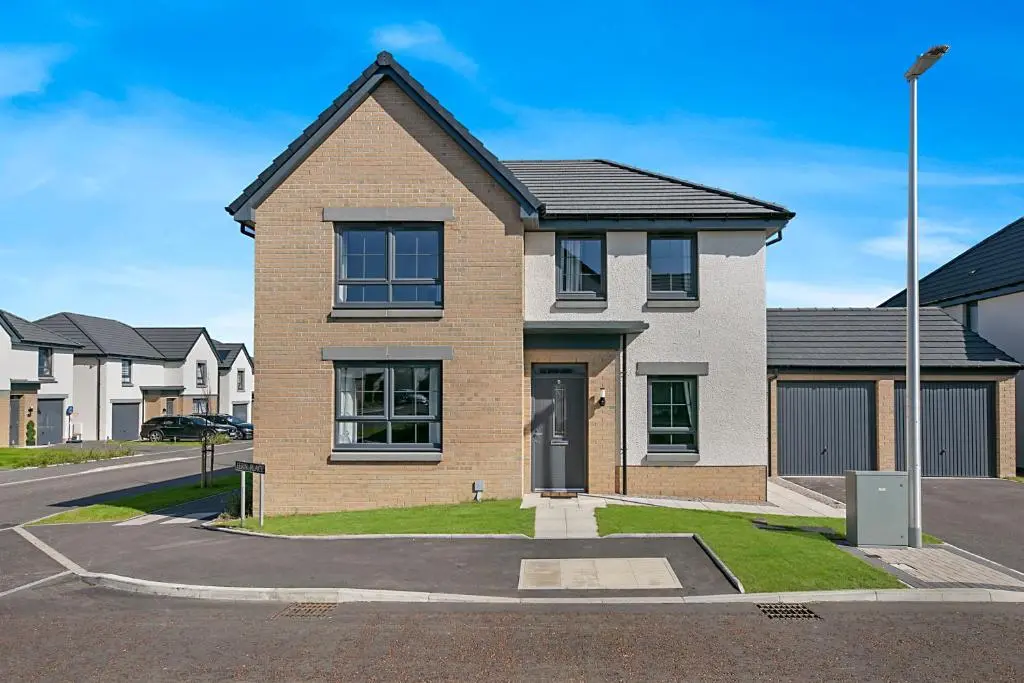 a brick house on a street with houses at Fern Place Villa - Grampian Lettings Ltd in West Cults