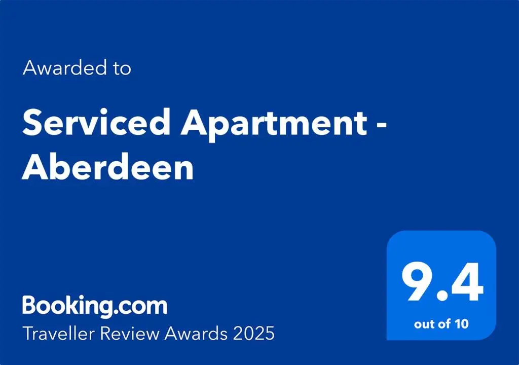 a blue sign with the words serviced appointment aberdeenakedakedakedakederald at Serviced Apartment - Aberdeen in Dyce