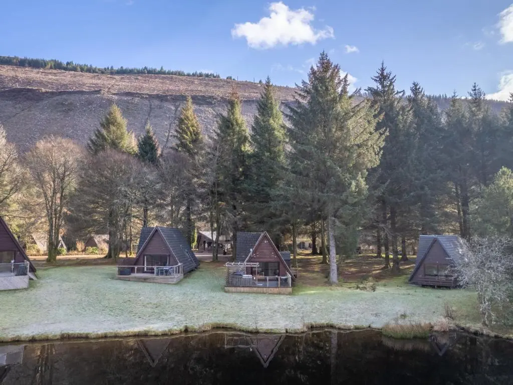 an aerial view of a group of cottages at Chalet Woodhaven by Interhome in Spean Bridge