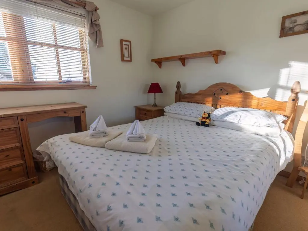 a bedroom with a bed with two mattresses on it at Apartment Millar House by Interhome in Inverness