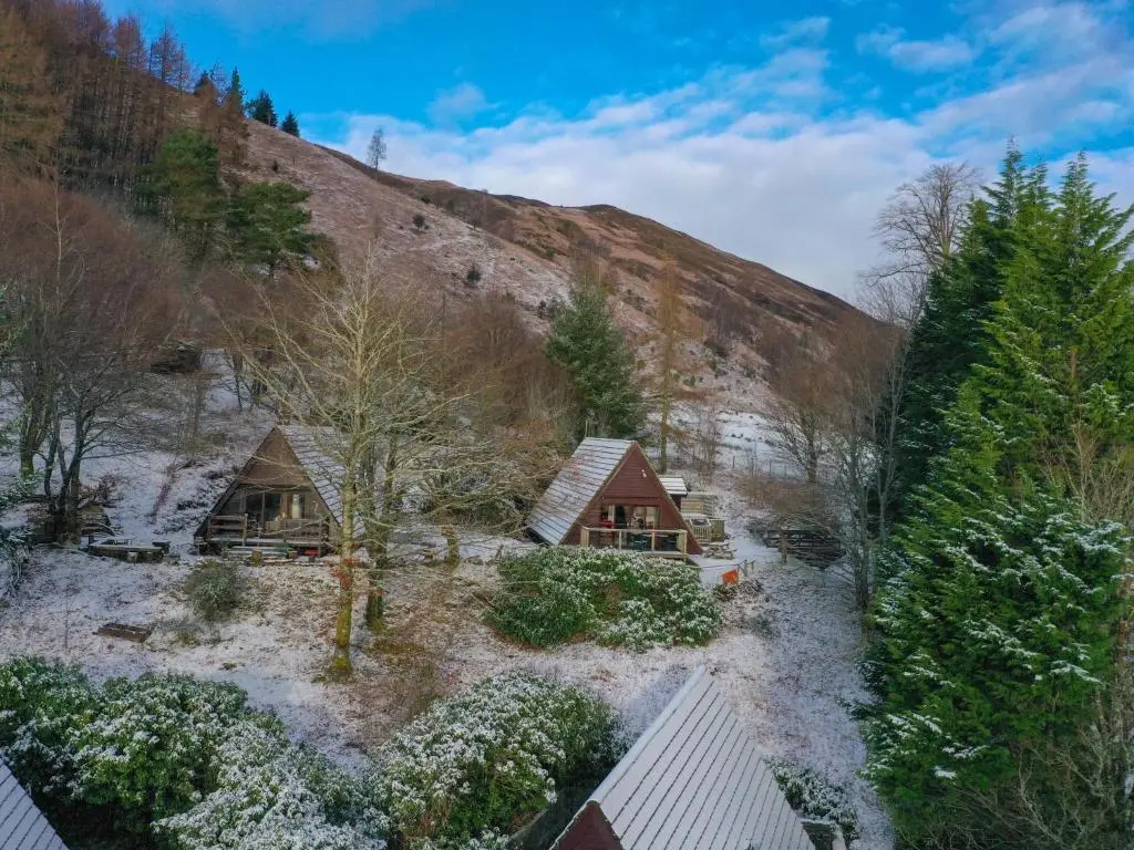 an aerial view of cottages in a mountain at Chalet Rivendell by Interhome in Spean Bridge
