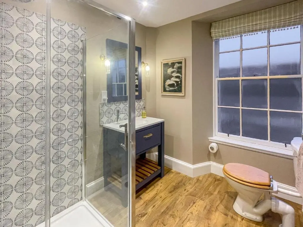 a bathroom with a shower with a toilet and a sink at 5 Bed in Blacklunans CA409 in Cray