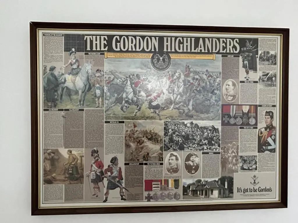 a framed collage of pictures on a wall at Buckie Haven 3 Bed Contractors Business Travellers in Buckie