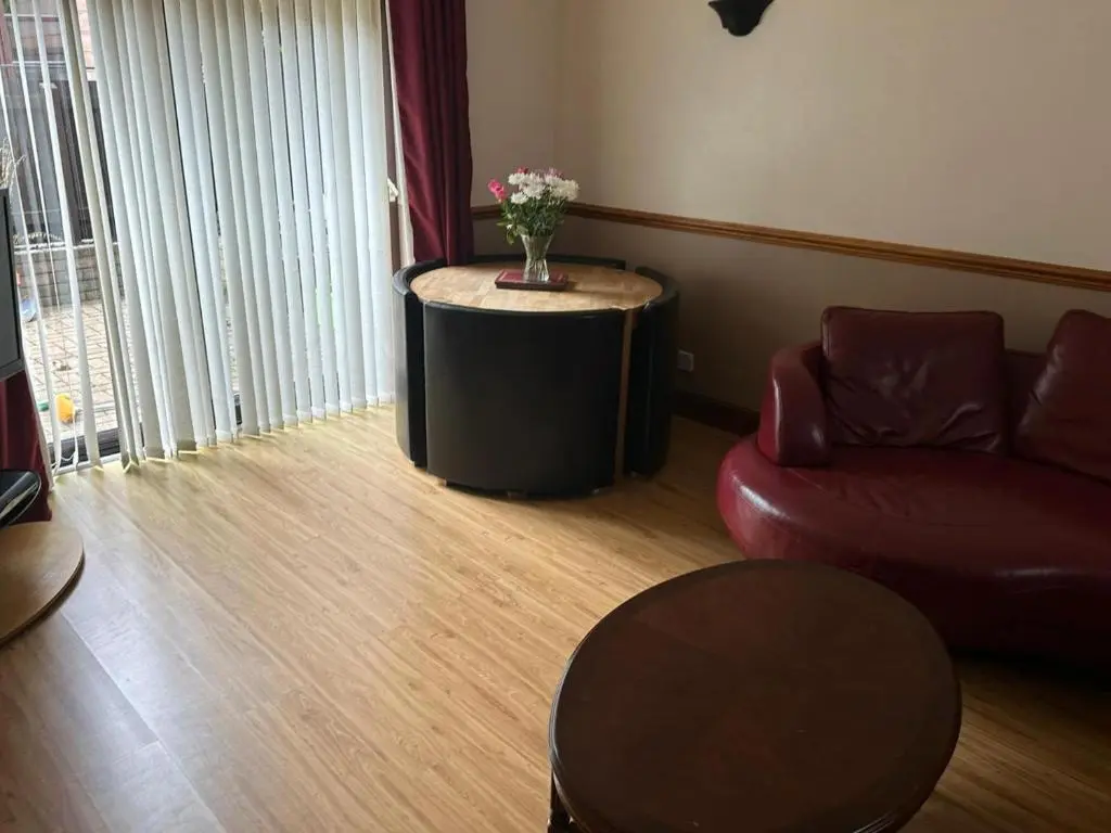 a living room with a couch and a table at Buckie Haven 3 Bed Contractors Business Travellers in Buckie