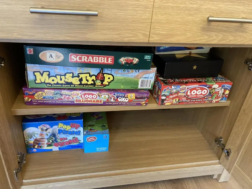a drawer filled with lots of boxes of candy at Lodge 24 in Spean Bridge