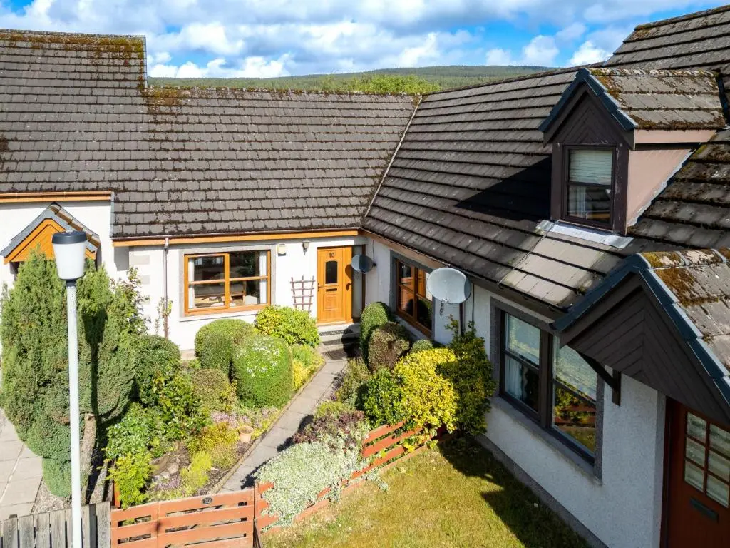 a house with a black roof at Holiday Home Braeriach by Interhome in Aviemore