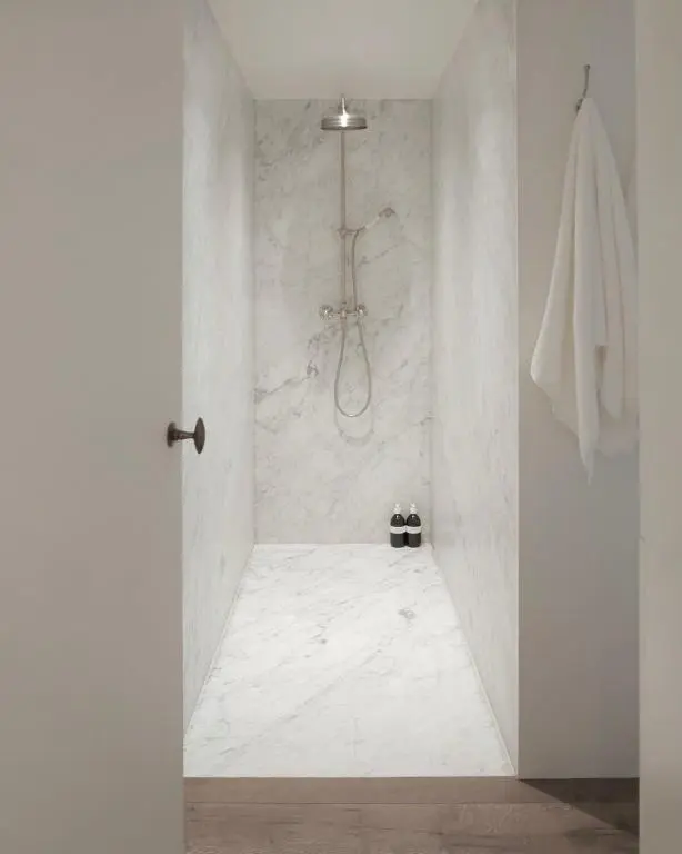 a bathroom with a shower with a white marble floor at Laggan Cottage - Charming home along River Gairn with unique panoramic room in Ballater