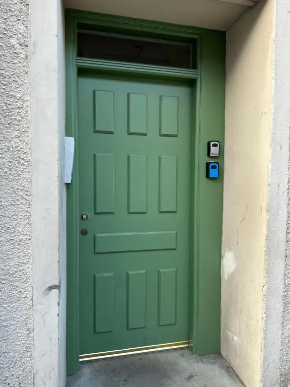 a green door in a building at Riverview Apartment, Inverness in Inverness