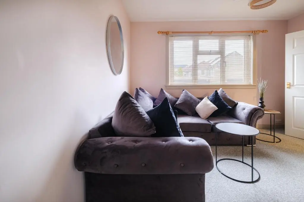 a living room with a couch and a table at Banchory House - SJA Stays - 2 Bed House in Banchory