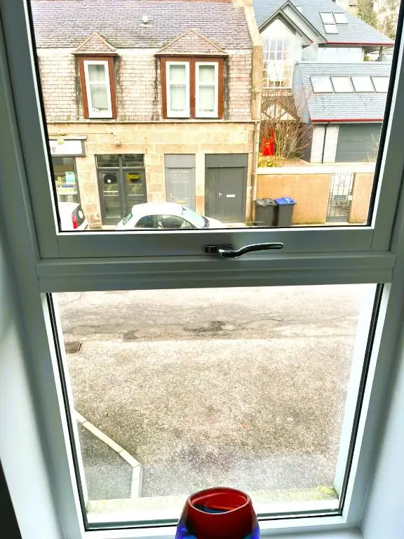 a window with a view of a street at Entire flat in Banchory, Aberdeenshire, Scotland in Banchory