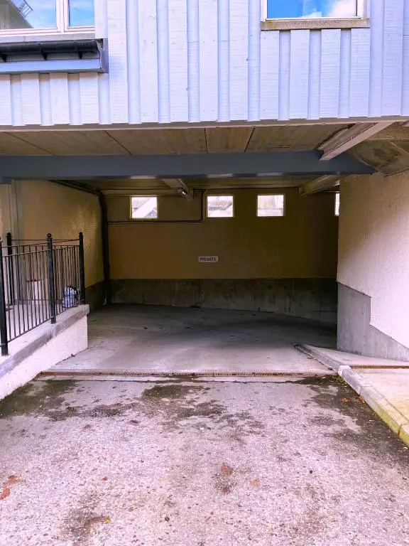 an empty parking lot next to a building at Entire flat in Banchory, Aberdeenshire, Scotland in Banchory