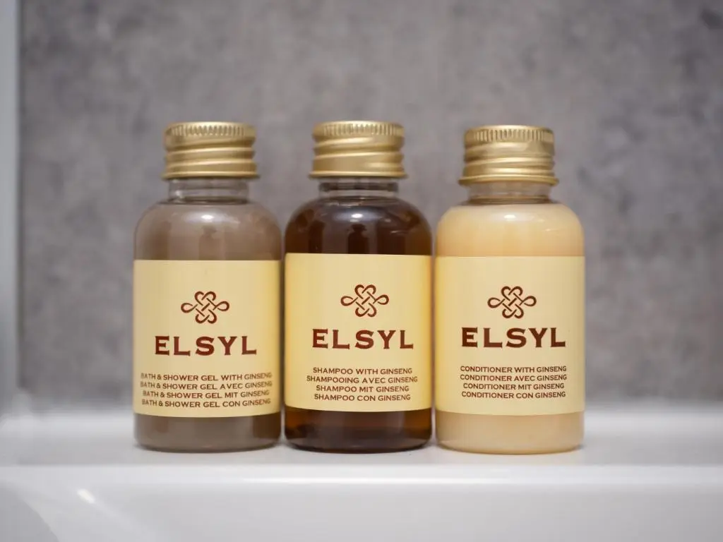 three bottles of honey sitting on a shelf at Apartment Harbour Nights Deluxe 7A by Interhome in Lossiemouth
