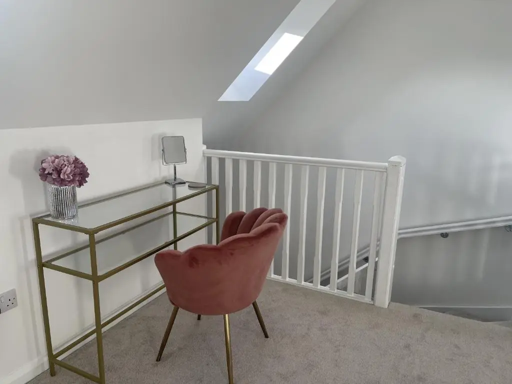a room with a chair and a glass table at 4 Guests - Inverness Highland Hideaway Nc500 in Inverness