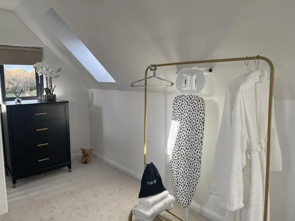 a room with a closet with a dresser and a window at 4 Guests - Inverness Highland Hideaway Nc500 in Inverness