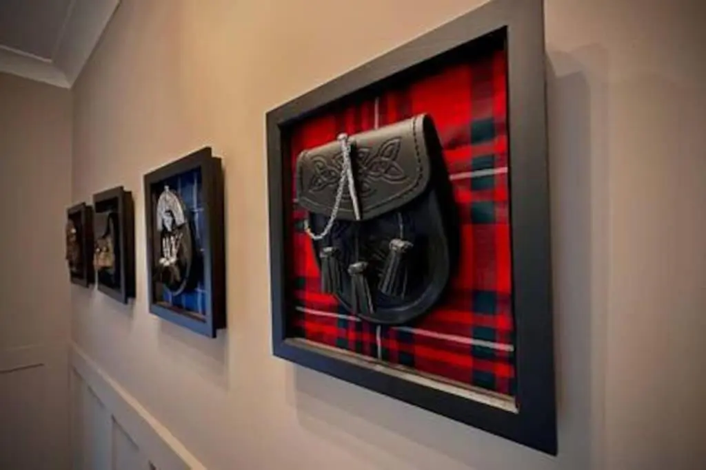 a picture of a bag hanging on a wall at Treat Yourself To Luxury & Style in Inverness