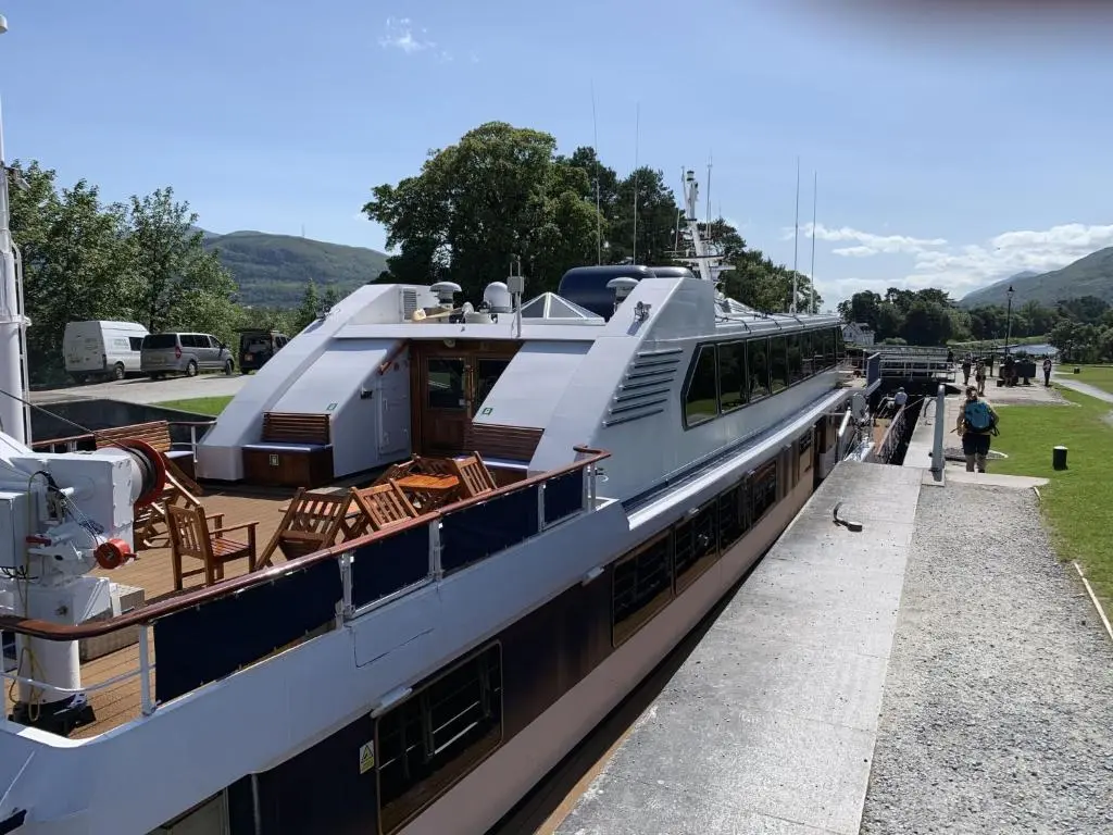 a large boat is docked at a dock at Chalet Oich View by Interhome in Spean Bridge