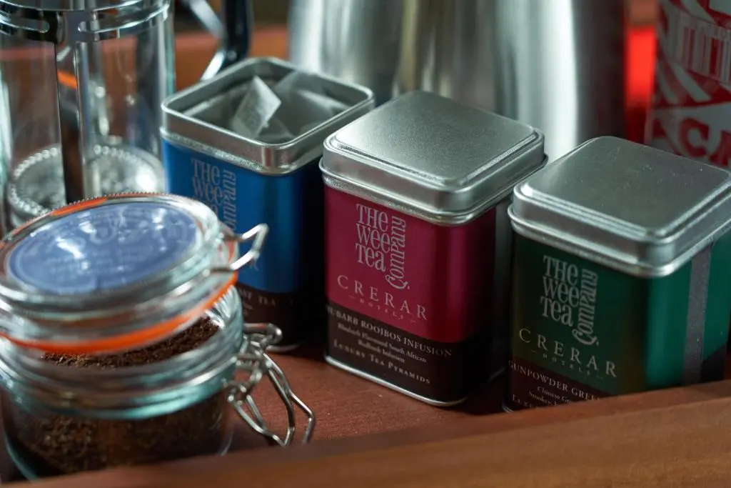 a group of jars of spices sitting on a shelf at Golf View Hotel & Spa in Nairn