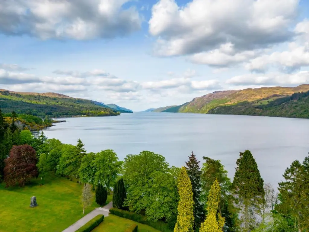 a view of a lake in the hills at Courtyard Cottage 3, Riverside Cottage in Fort Augustus