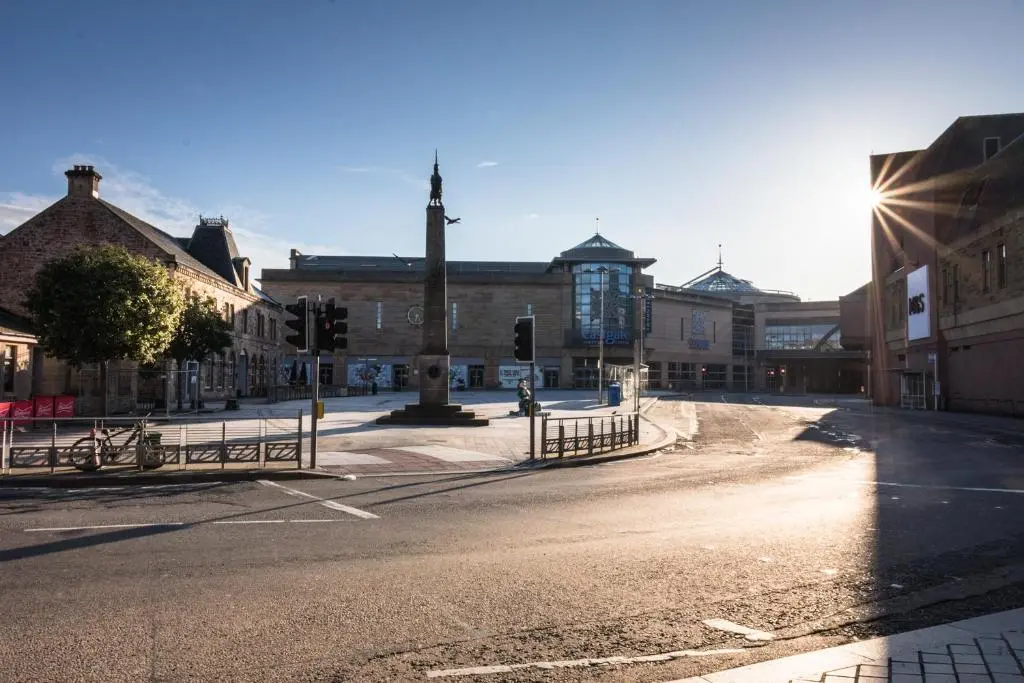 an empty street in a city with a street light at Haugh Hideaway in Inverness