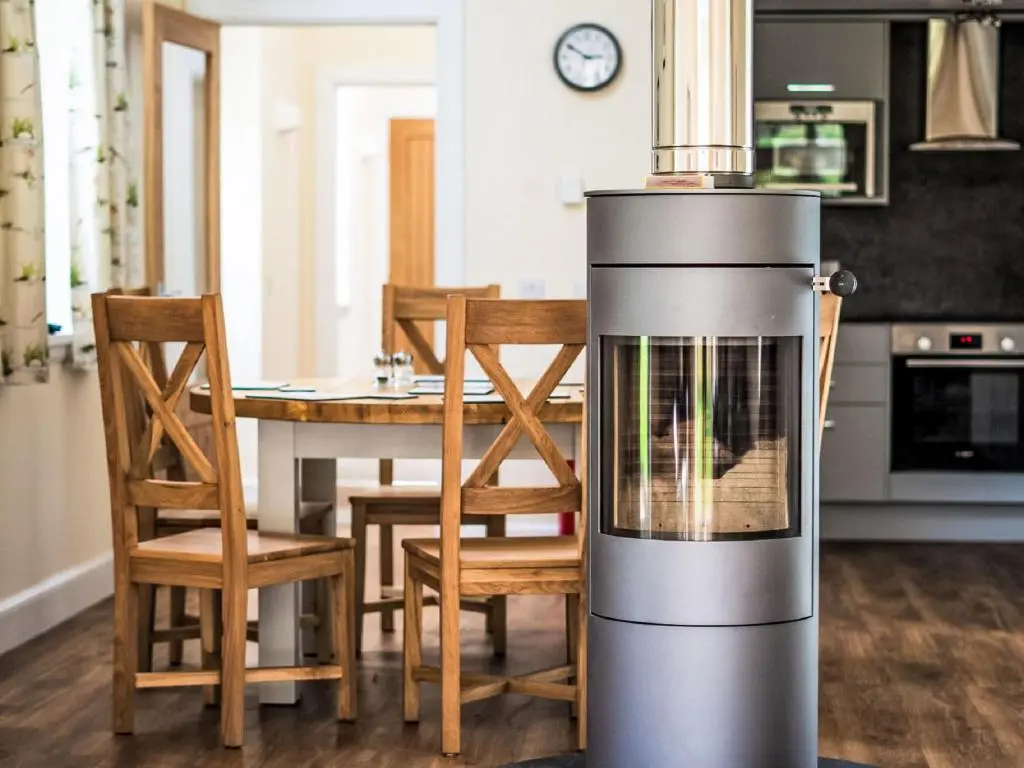a kitchen and dining room with a stove at Holiday Home The Barn by Interhome in Drumnadrochit