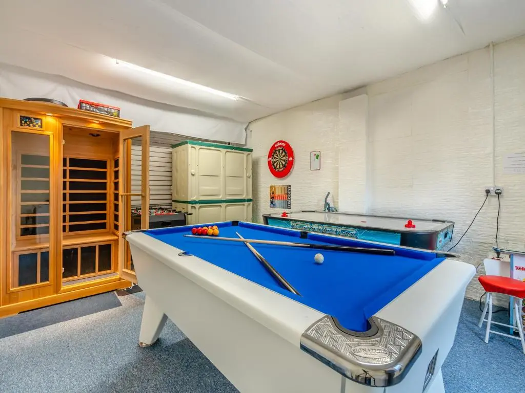 a billiard room with a pool table in it at Cairn View - S4402 in Inverdruie