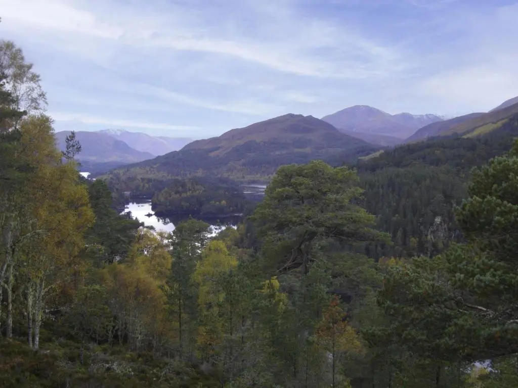 a view of a valley with a river and mountains at Glomach Lodge at Lochletter Lodges in Drumnadrochit