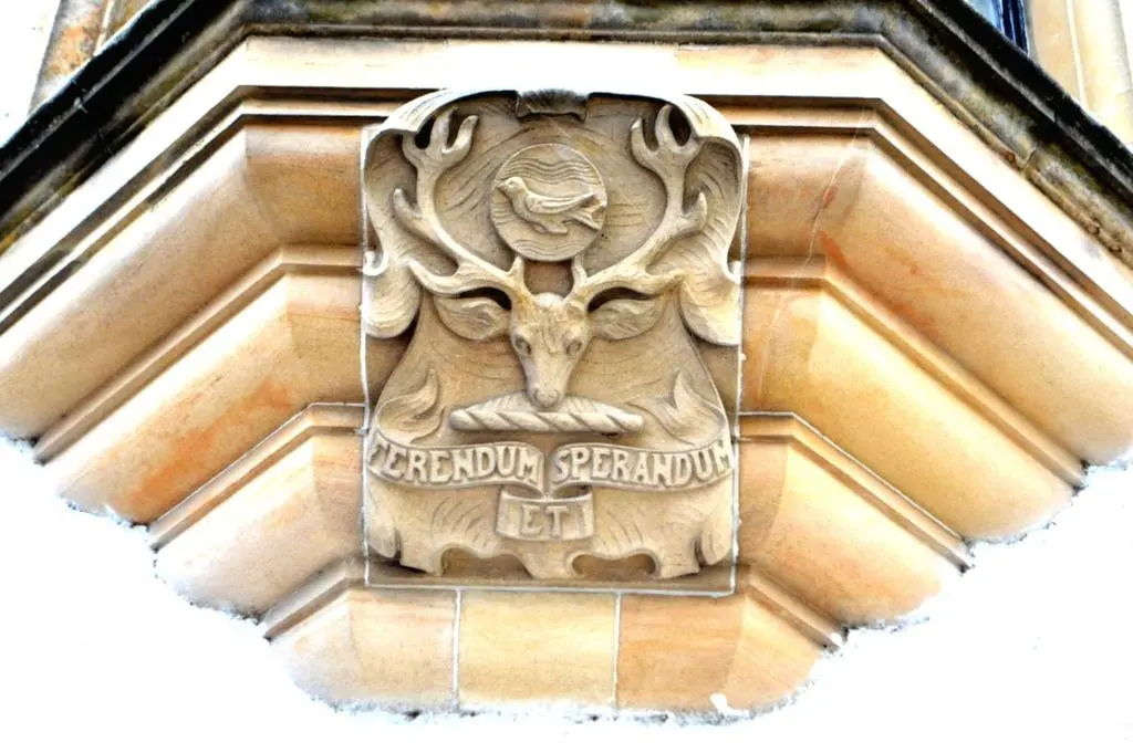 a plaque on the side of a building at Kincraig Castle Hotel in Invergordon