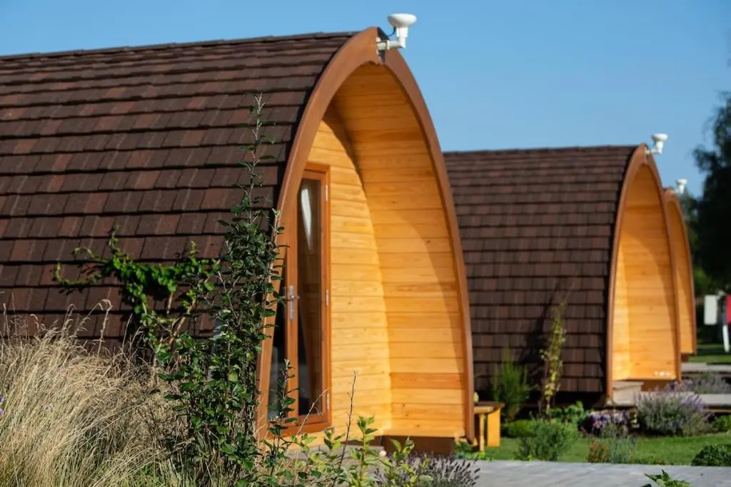a small wooden house with a brown roof at Findhorn Ecovillage Escape Eco Pod Pet free in Findhorn