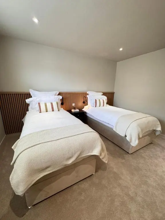 two beds in a hotel room with at No 67 West Road in Fraserburgh