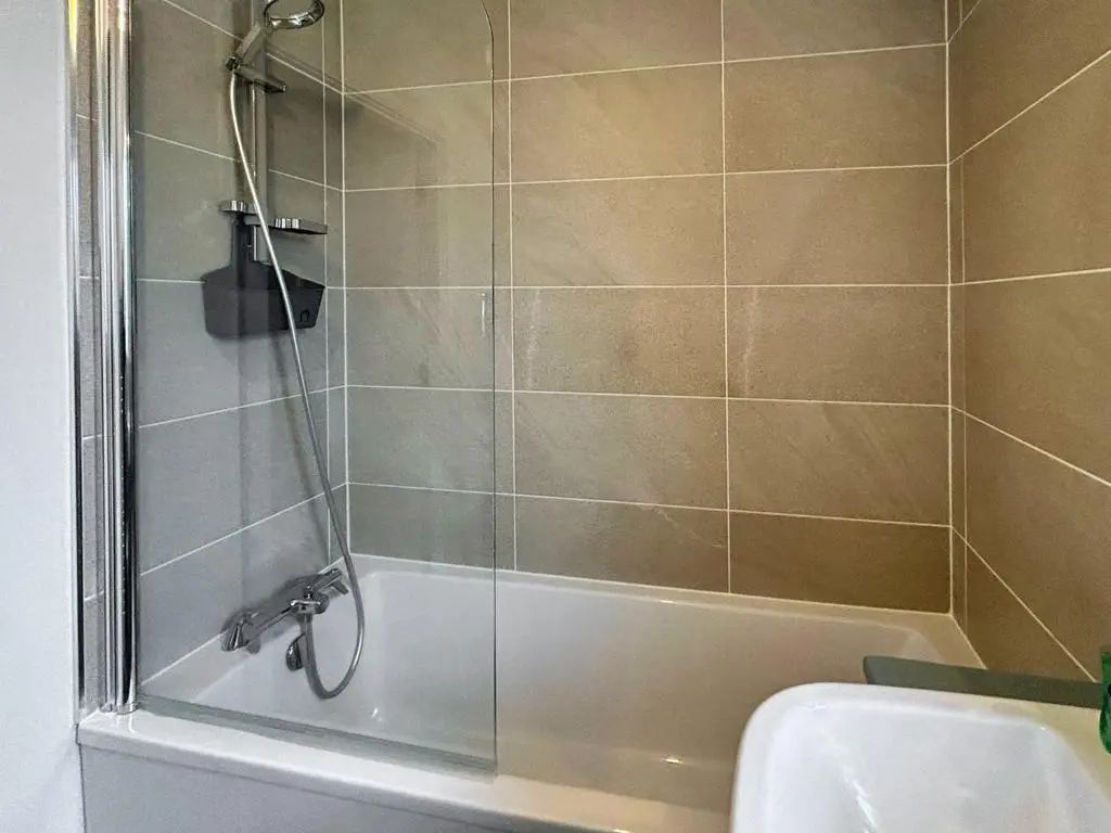 a bathroom with a shower and a sink at Faillie in Inverness
