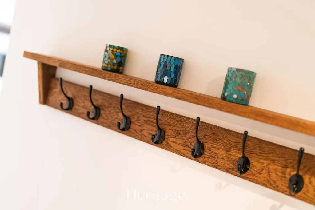 a wooden shelf with some glasses on it at The Stables Cottage, Aboyne, Peaceful Stay in Royal Deeside in Aboyne