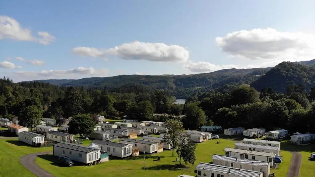 an aerial view of a village in the mountains at Faskally Woods Holiday Park in Pitlochry