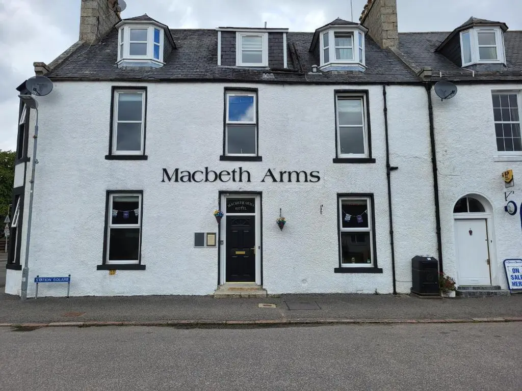 a white building with the words macbeth arms at Macbeth Arms in Lumphanan