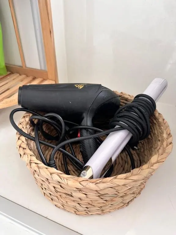 a basket filled with wires on a counter at Cosy Laurel Nest Near Loch Ness in Inverness