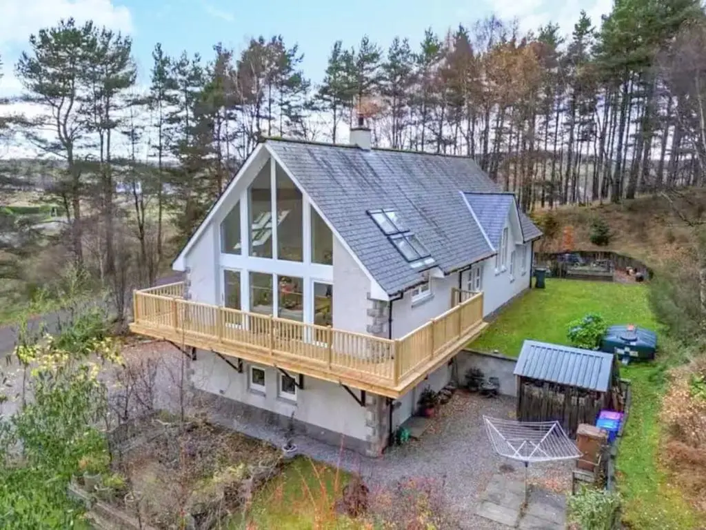 an aerial view of a house with a deck at Stunning 4 bed rural retreat in Aberlour in Aberlour