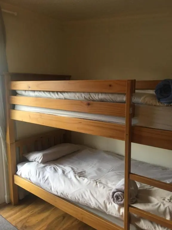 two bunk beds in a small room with at 1 Lochness Rooms&Hostel in Drumnadrochit