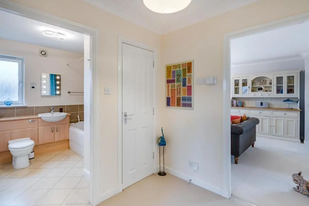 a bathroom with a toilet and a sink at 2 Bed in Aviemore oc-t30584 in Aviemore